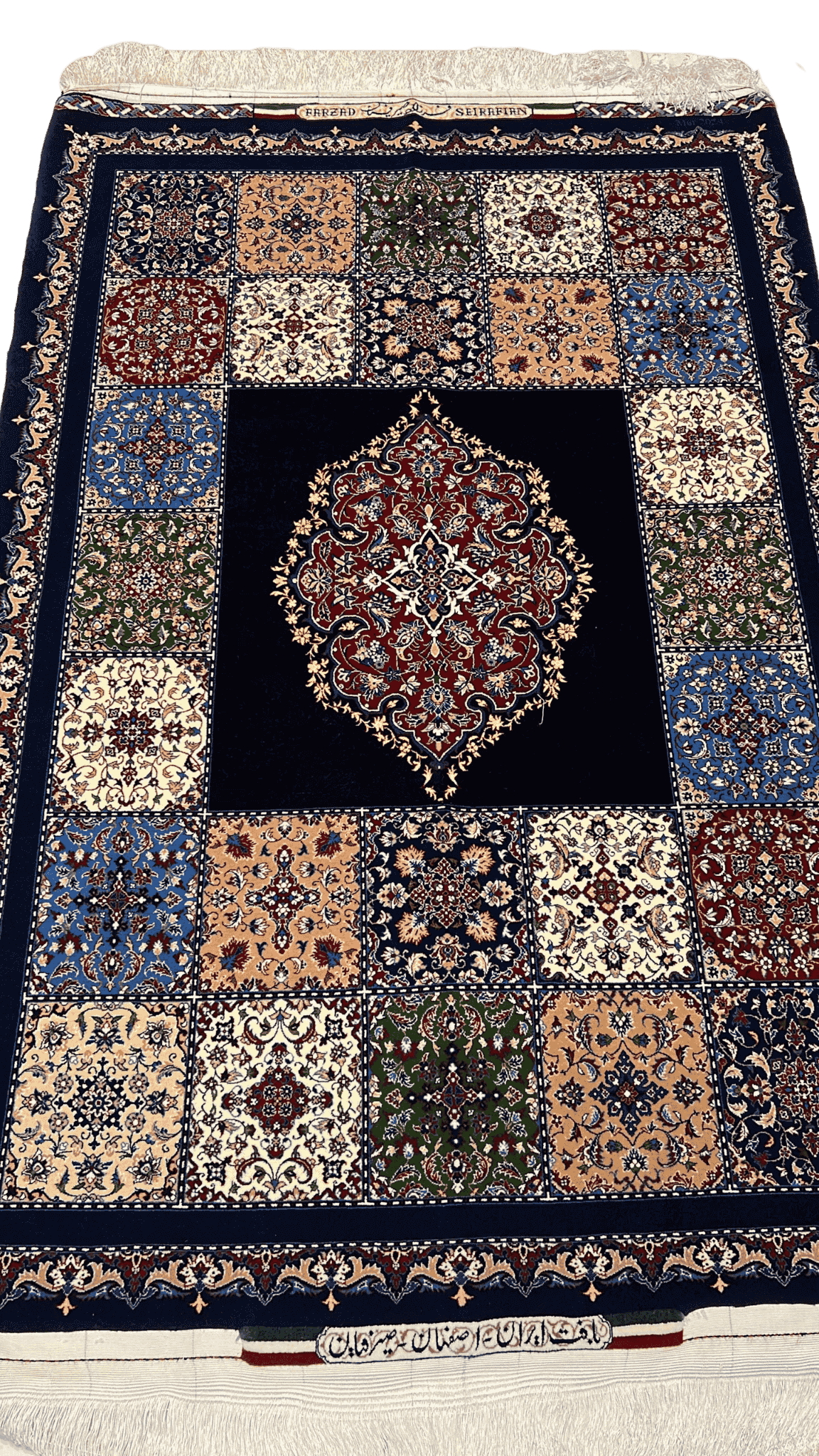 "Hand-knotted Farzad Seirafian Persian rug with central medallion and floral motifs, made from silk and wool, measuring 5x3.5 feet, crafted in Isfahan."